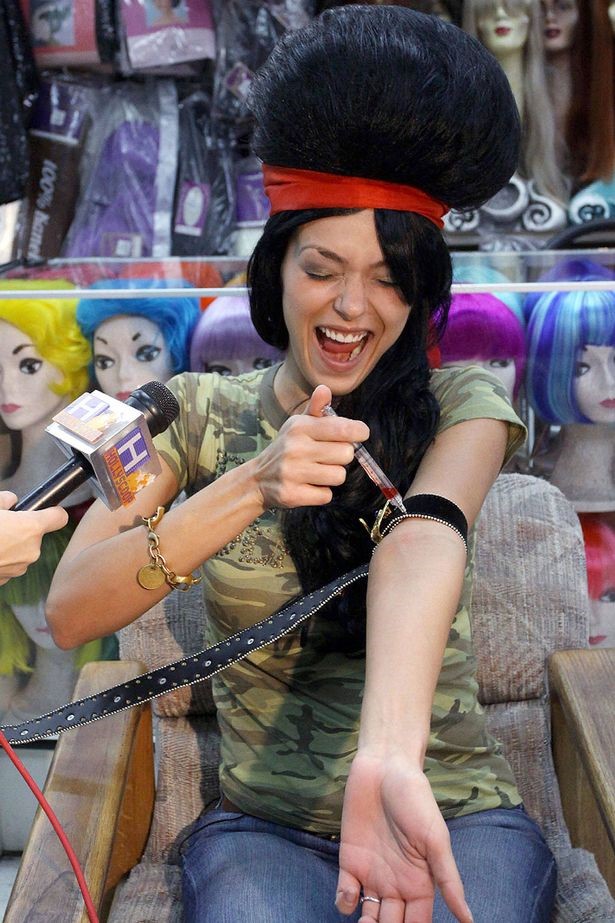 Adrienne Curry as Amy Winehouse, Source: TMZ